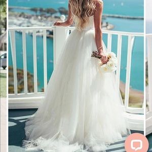 New never worn wedding gown with under-skirting tulle for full princess effects